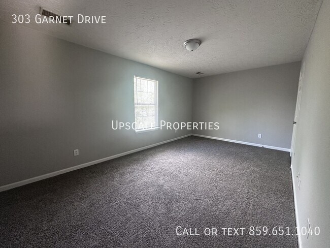 Building Photo - 303 Garnet Dr