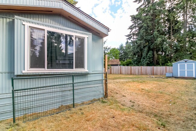 Building Photo - Updated 2 bedroom manufactured home on large corner lot