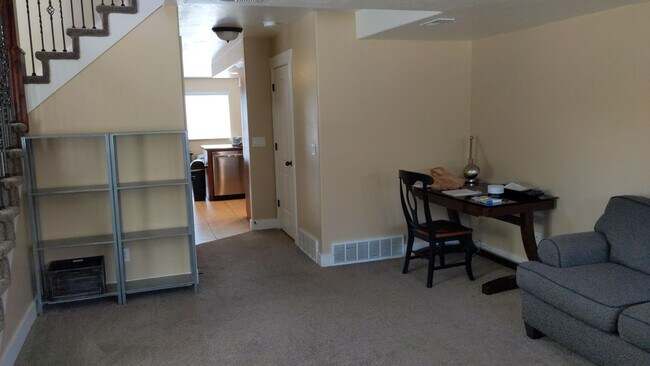 From inside front door - 122 S Tamarak Cir