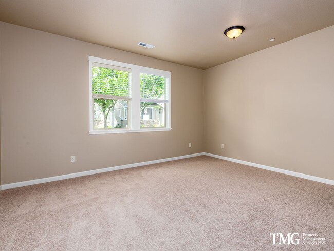 Building Photo - Modern Living with A/C and Attached Garage!