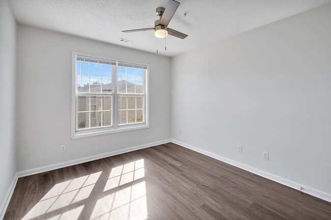 Building Photo - RENT SPECIAL! Freshly Painted! New Luxury ...