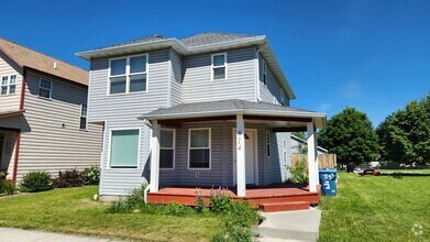 Building Photo - Beautiful House with Yard and Pets Considered