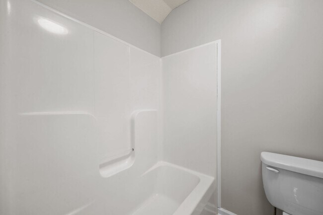 Building Photo - Charming Brick Home with Soaring Ceilings & Updated Finishes!