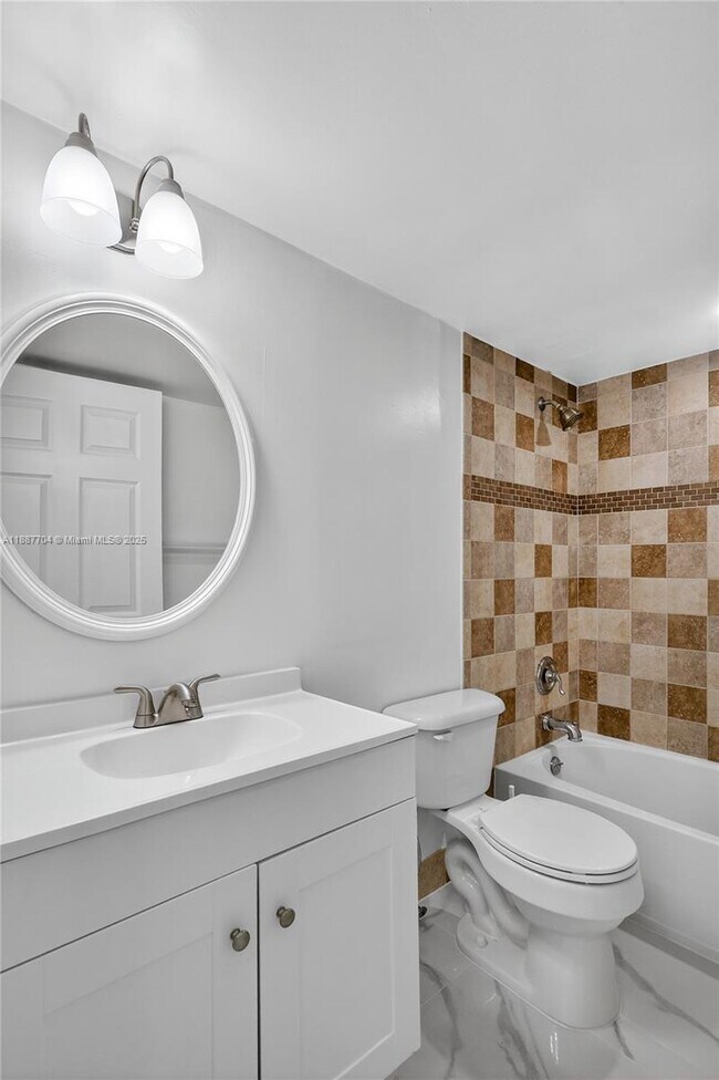 Building Photo - 9915 W Okeechobee Rd