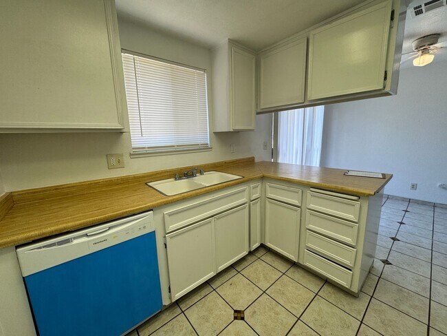 Building Photo - Two Bedroom Triplex with One Bathroom and ...