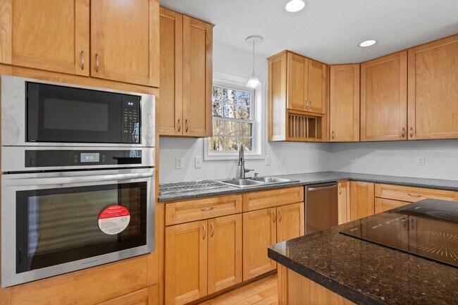 Building Photo - Charming 3+ Bedroom Cape Cod with Water View – Between Traverse City & Suttons Bay