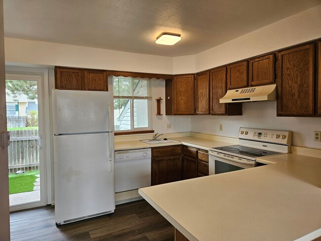 Building Photo - Adorable Loft Style One Bedroom Condo Steps from Buckley AFB