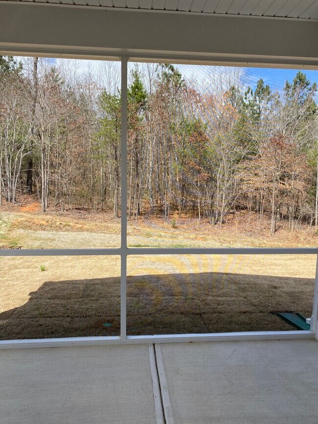 Building Photo - Spacious 1.5-Story 4BR Home with Bonus Room in Active 55+ Community