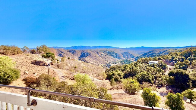 Building Photo - Spacious Two-Story Country Home with Amazing Views Looking out, and Privately Fenced and Gated Ya...