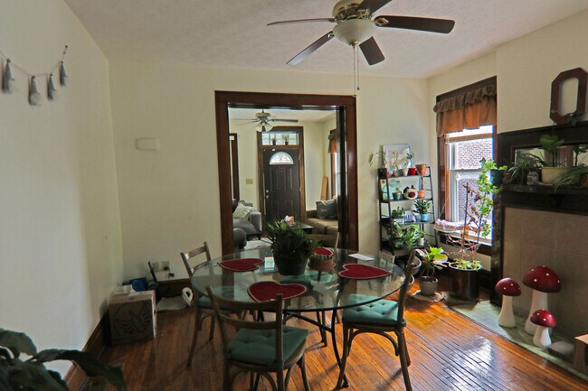 View of front door, living room and dining room - 372 E Oakland Ave