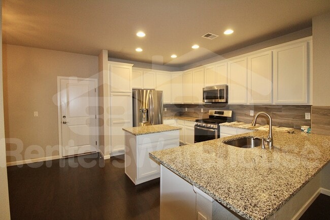 Building Photo - 8966 E Caley Way