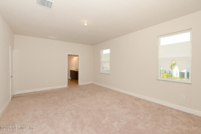 Building Photo - 10976 SW Tessili Wy