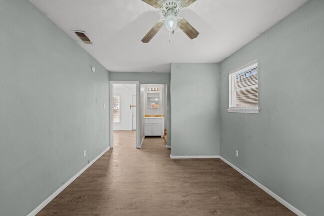 Building Photo - Updated Home with Gorgeous Floors & Large Backyard