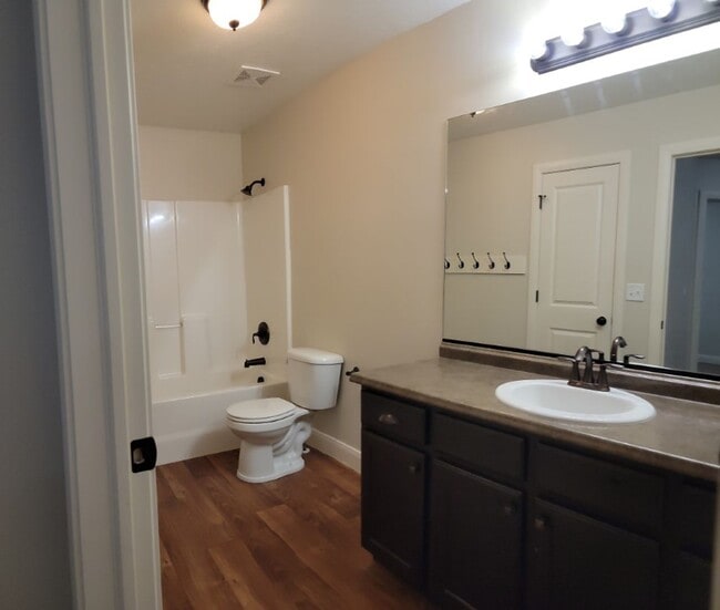 Building Photo - Spacious 4-Bedroom Home in Highly Sought-After Summerfield Community!