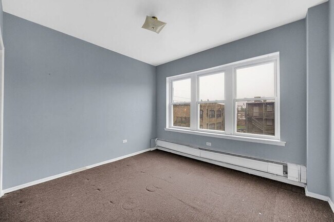 Building Photo - 7019 S Merrill Ave