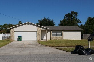 Building Photo - Spacious 4/2 home with 2 car garage Availa...
