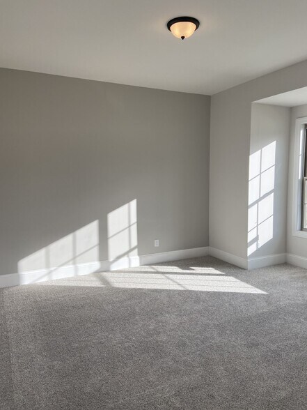 front office with views of neighborhood pond - 1026 October Park Way