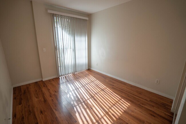 Building Photo - 2-Bedroom Condo with some Utilities Includ...