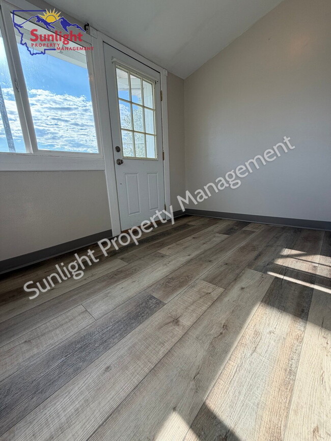 Building Photo - 2 Bed, 1 Bath Home with Detached Garage, Fenced Yard, and Built-In Storage