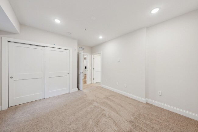 Building Photo - "NEW CONSTRUCTION 3-Bed Condo with Granite...