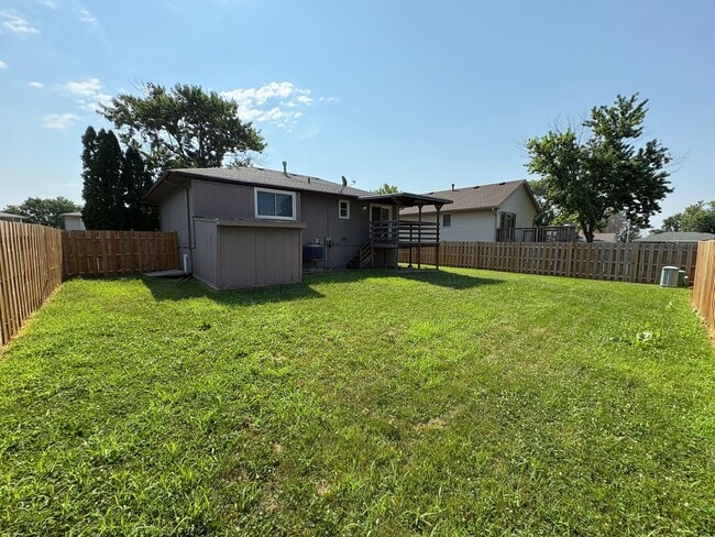 Building Photo - Spacious Single-Family Home with Fenced Backyard & Attached Garage