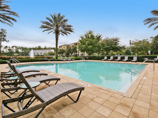 Building Photo - Introducing a captivating 3-story townhome...