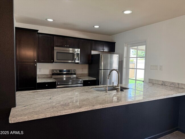 Building Photo - 4613 S Rita Ln