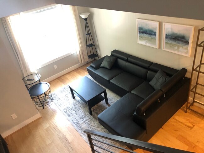 Living room w/ pull-out couch - 614 I St NE