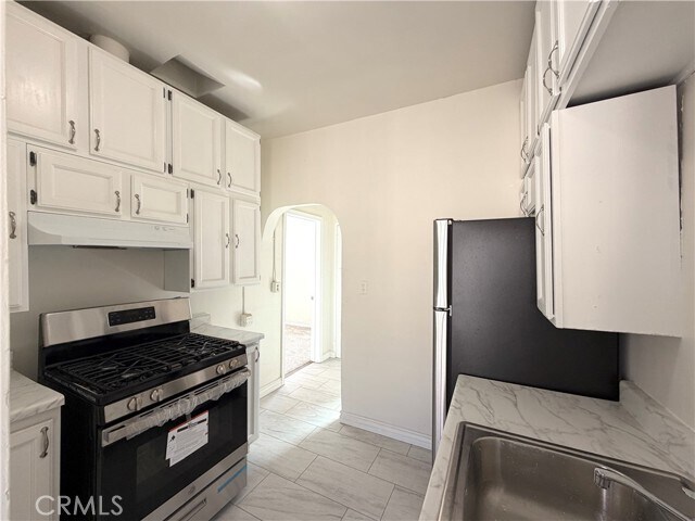 Building Photo - 5036 Denker Ave