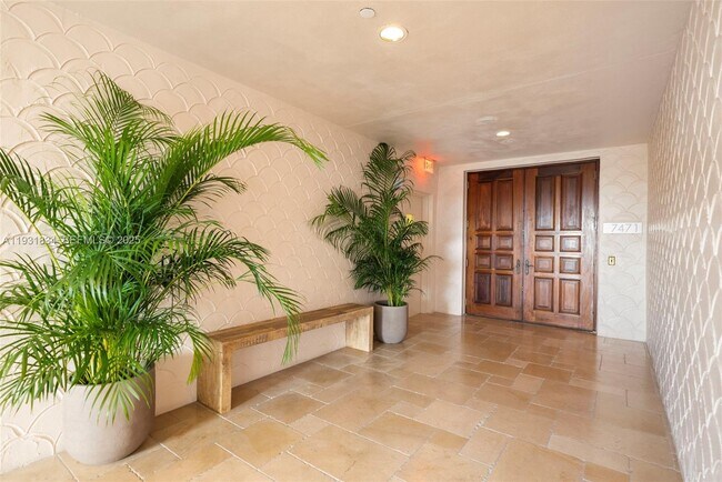 Building Photo - 7471 Fisher Island Dr