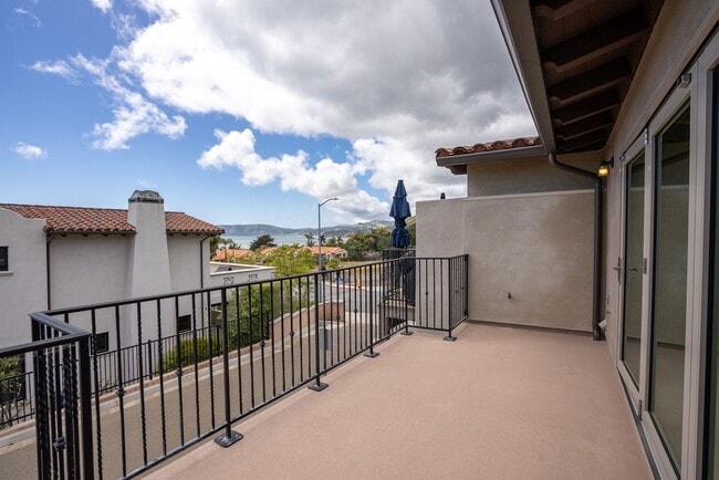 Building Photo - This Sunset Beach Estates Townhome will ha...