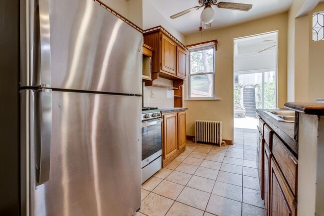 Building Photo - AVAILABLE June 2026 - Beautiful 4 Bedroom, 2 Bath Home w/ Front Porch Swing!