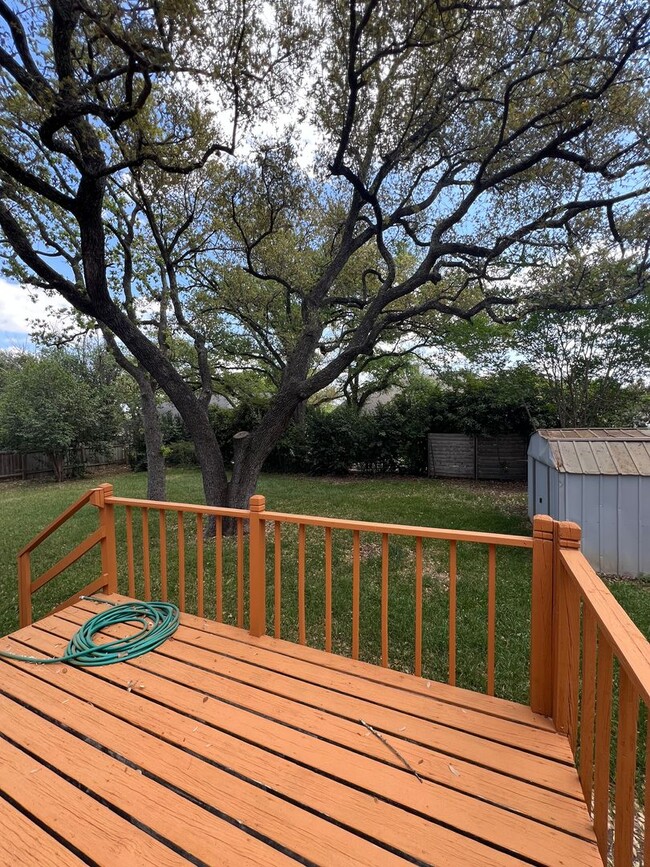 Building Photo - Corner Lot with Large Deck and Cozy Backyard