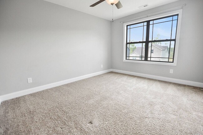 Building Photo - Pet Friendly Three Bedroom with Bonus!