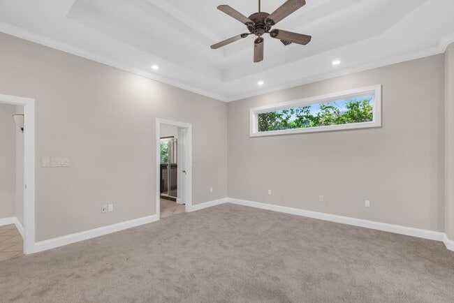 Building Photo - Spacious unfurnished 4B/3B home in Gated Community of Emerald Lakes