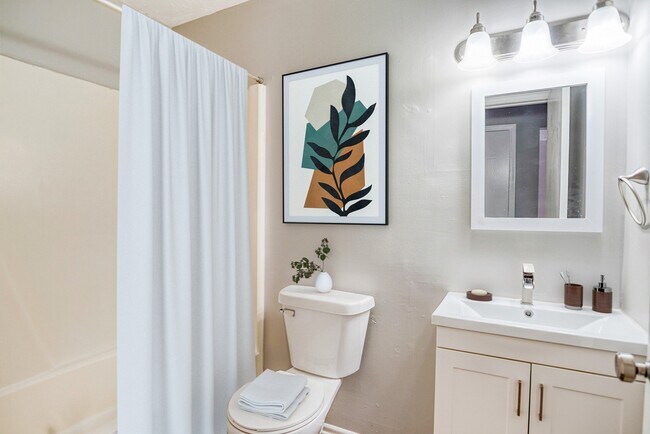 white bathroom toilet sink mirror - Hillside Apartments