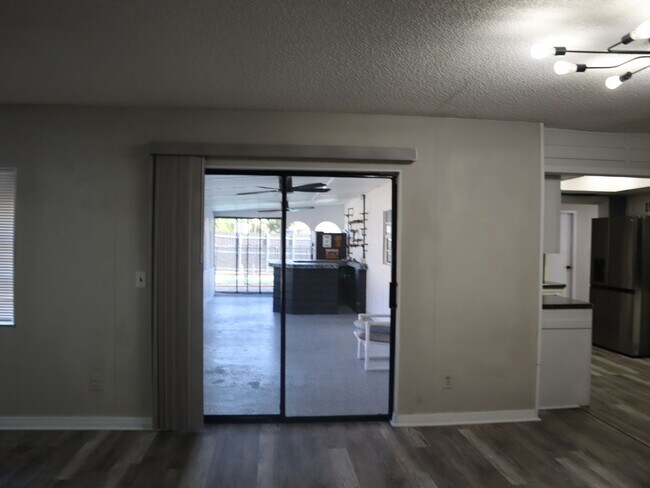 Building Photo - 4 BEDROOM 2 Bath  Pool Home!  Call Carole Arcaro 386-216-4900 Deltona Lakes Realty