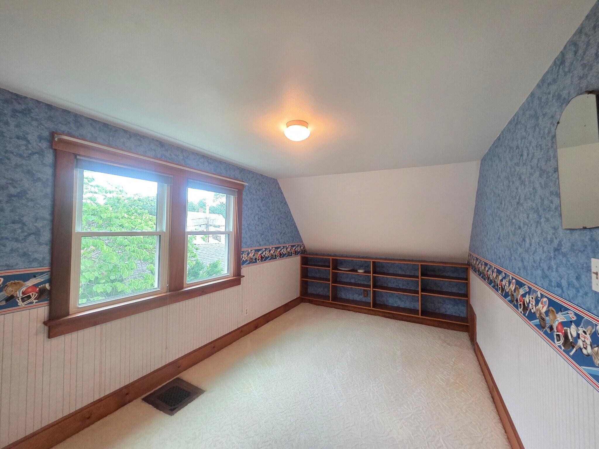 Upstairs bedroom #2 with built-in shelves and huge closets - 2412 E Ohio Ave