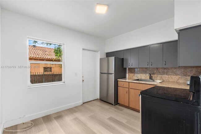 Building Photo - 4853 NW 15th Ave