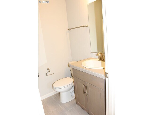 Building Photo - Modern 3-Bedroom Townhome-Style Home with Attached Garage, Private Patio & En-Suite Bathrooms in ...