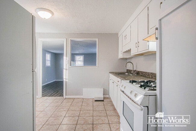 Building Photo - Well-maintained two-bedroom, one-bath home with a practical layout, & cozy living areas.