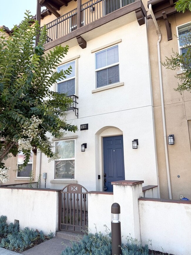 Building Photo - Stylish 3-Story Townhome with Balconies & Open-Concept Living