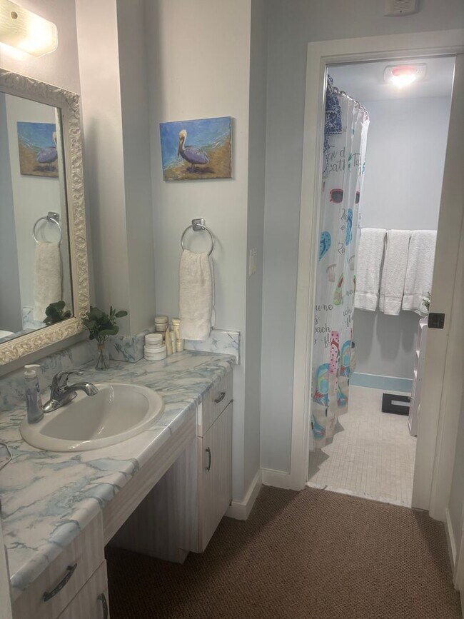 Building Photo - Get your Toes in the Sand at this Fully Furnished One Bedroom Beachfront Condo-Start June 1-2026