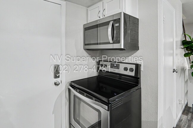 Building Photo - SE!! Close to UNLV!! 2 Bedroom 2 story!! 1 Car Carport!! Fully Furnished!! Community Pool!! and T...