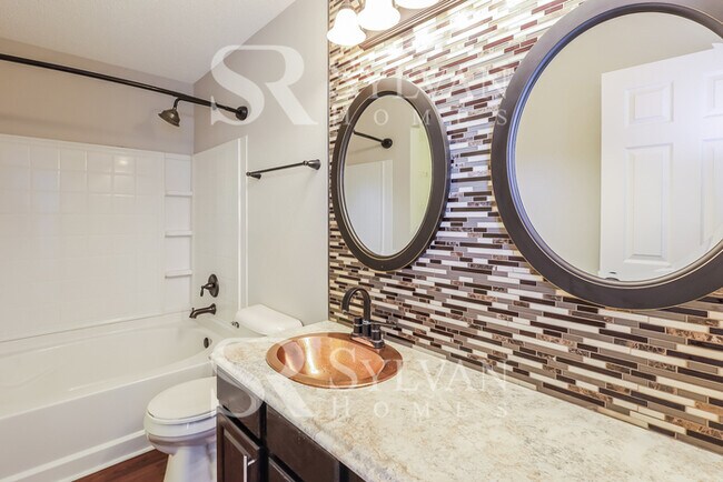 Building Photo - This lovely 4BR, 2.5BA home is move-in ready