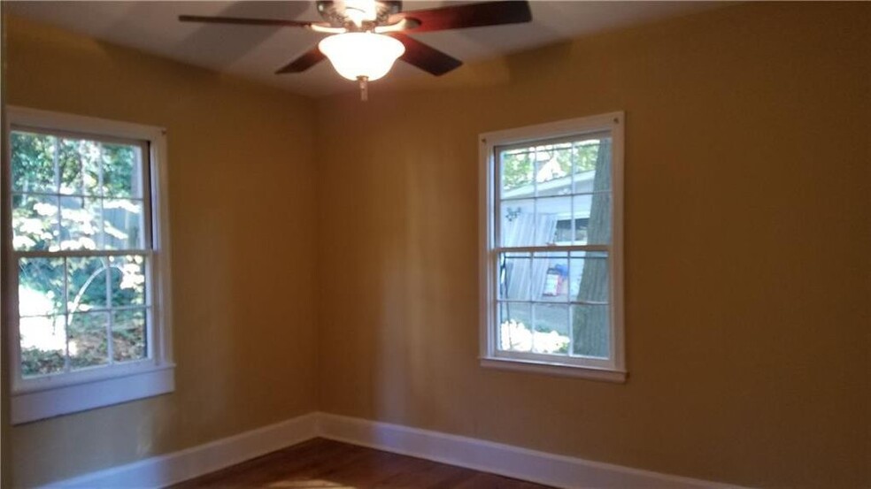 One of 3 bedrooms with ceiling fans - 802 S Candler St