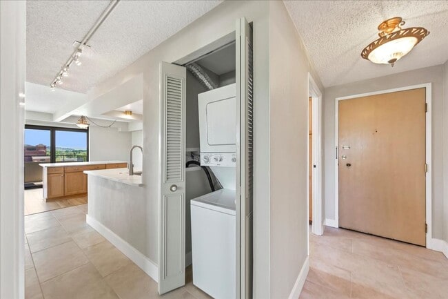 Building Photo - Stylish Imperial Plaza Condo in Prime Downtown Location