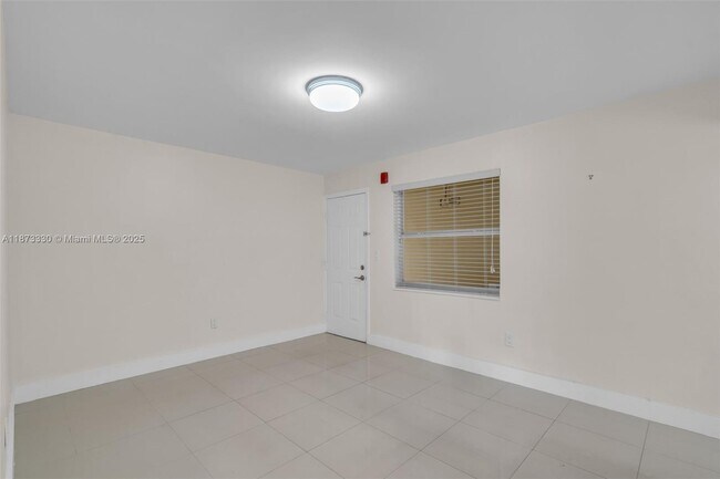 Building Photo - 241 S Royal Poinciana Blvd