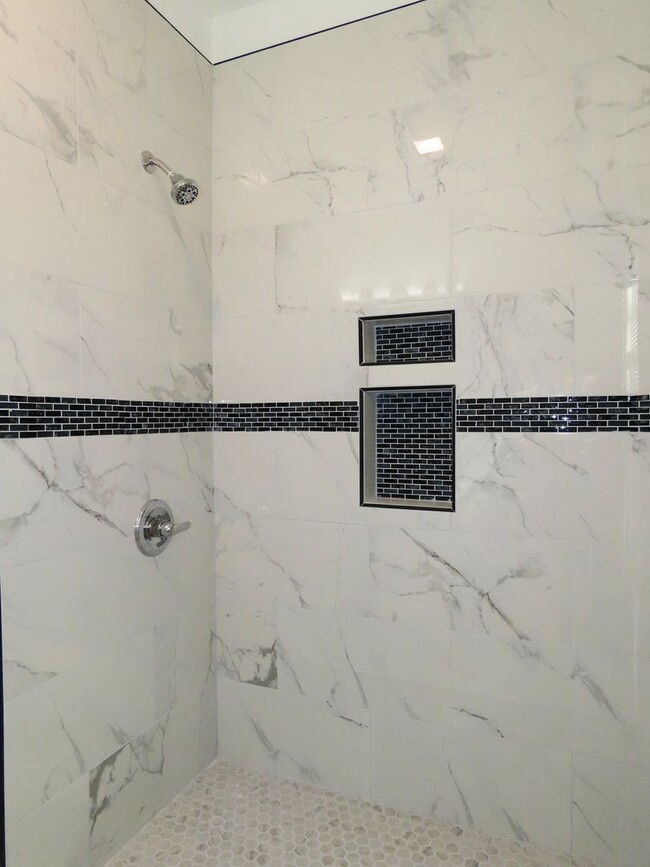 Building Photo - Newly Renovated 2 Bedroom, 1 Bathroom Cottage w/ Large Backyard! Storage Building