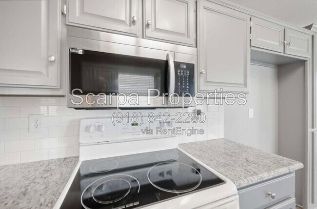 Building Photo - 9311 E 95th Pl